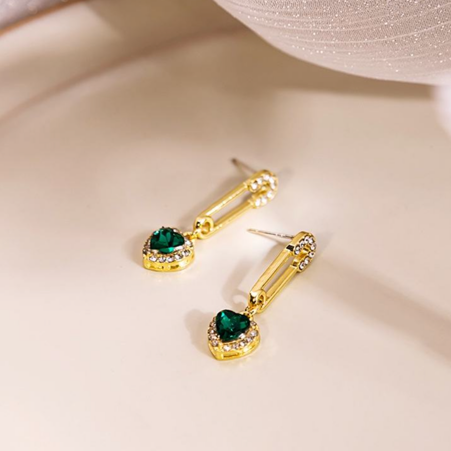 Trending Sweetheart Pin Earrings With Green Stone