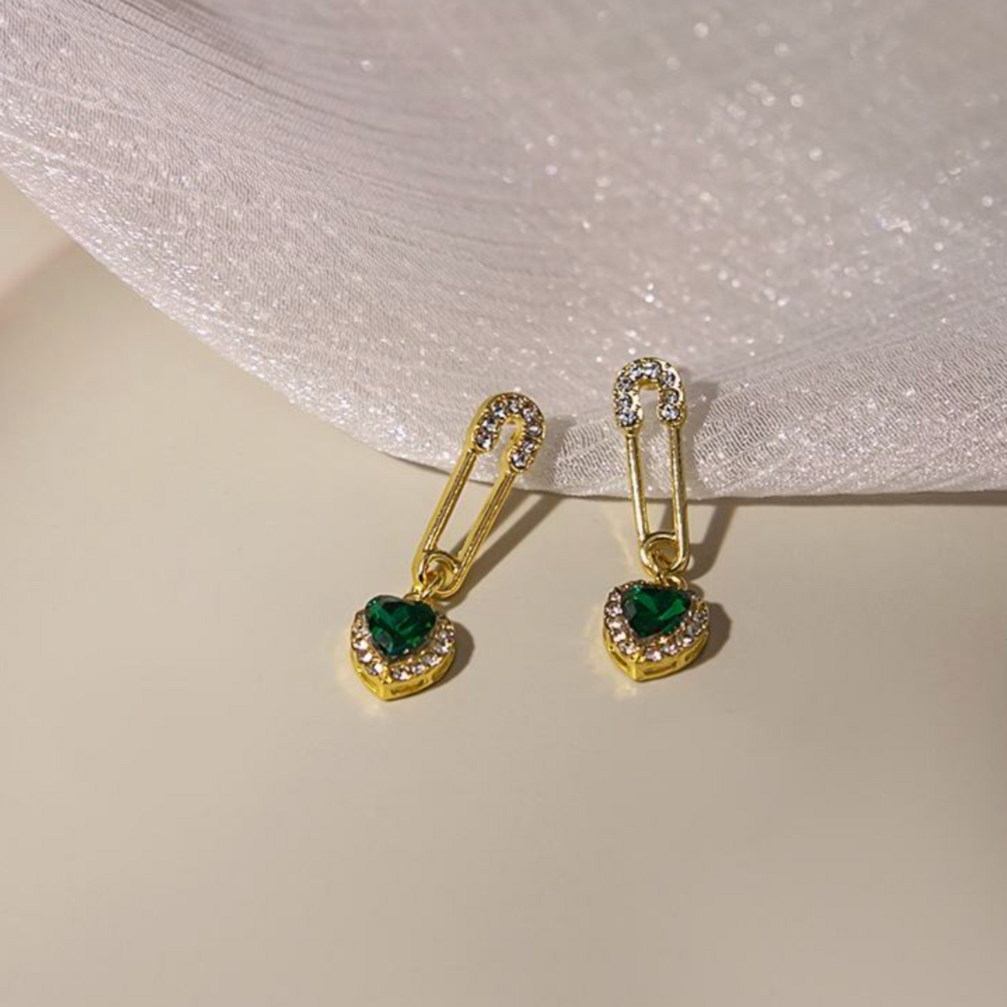 Trending Sweetheart Pin Earrings With Green Stone